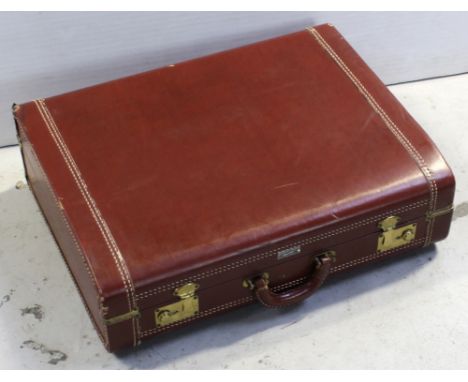 A vintage American Voyager brown leather suitcase, width 57.5cm.