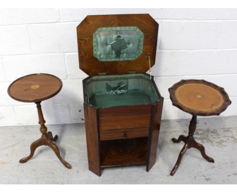 Two non matching mahogany wine tables, one with pie crust rim and faux leather insert, one with abstract inlay, both on turne