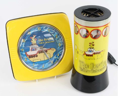 The Beatles, a Yellow Submarine table lamp of cylinderical form, the rotating interior showing the band members through porth