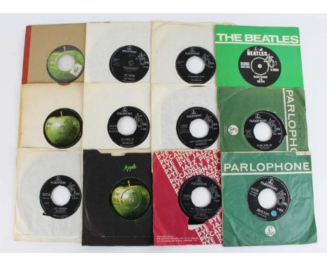 The Beatles, a collection of 7" singles to include I Wanna Hold Your Hand, We Can Work it Out, Hey Jude, She Loves You, Daytr