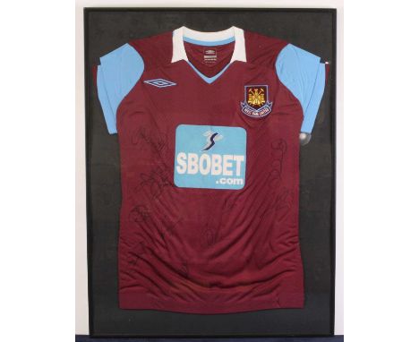 A West Ham replica first team shirt signed by members of the squad circa 2008/09 season, framed and glazed, 81 x 60cm 