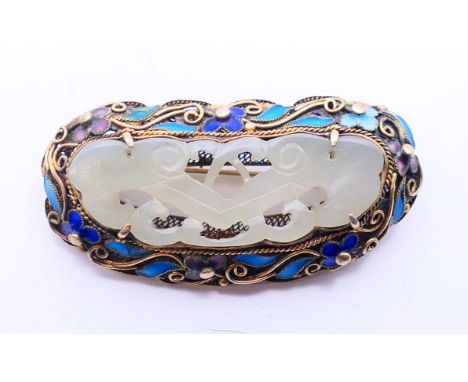 A Chinese silver, enamel and jade brooch.  5 cm x 2.5 cm.