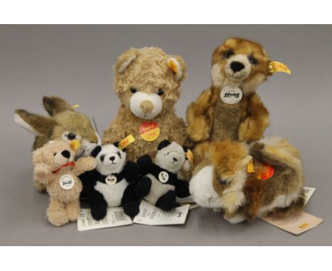 A collection of modern Steiff teddy bears. The largest 28 cm high.