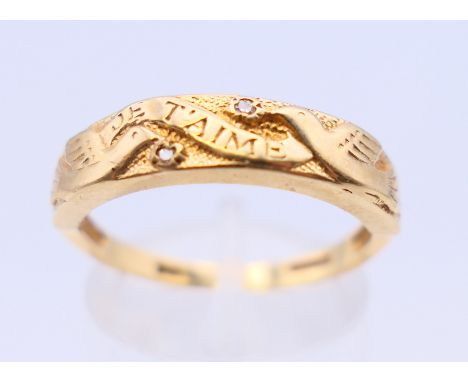 A 9 ct gold and diamond ring with two doves and marked Je T'aime. Ring size Q/R. 