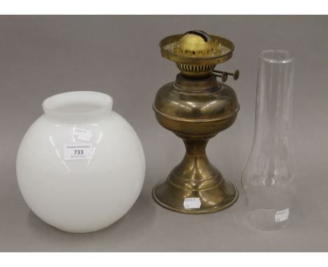 A vintage brass oil lamp. 48 cm high.