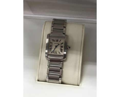 A Cartier stainless steel tank watch the square dial with Roman numerals, With extra links box and paper work.