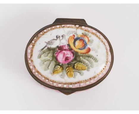 A South Staffordshire pink ground patch box, circa 1800, decorated with flowers and doves, or oval cushion form, 4cm wideProv