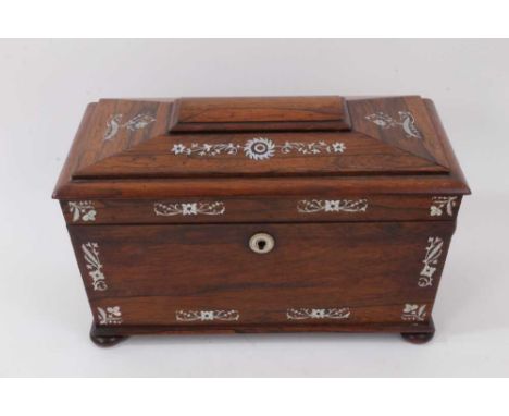 William IV rosewood sarcophagus form tea caddy with twin ring handles and inlaid mother of pearl decoration, raised on four b