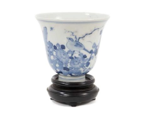 Chinese blue and white tea bowl and stand, Republic/20th century, painted with a bird perched on a branch, calligraphy to rev