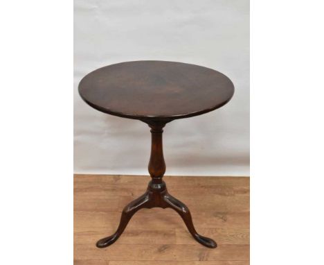 George II red walnut occasional table, with solid circular tilt-top on bird-cage action and vase shaped column on tripod cabr