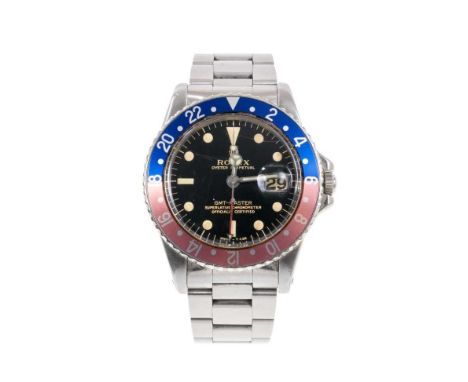 1966 Rolex GMT Master stainless steel wristwatch, model 1675A, serial number 1223130, circa 1966, the round black dial with l