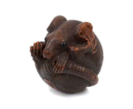 Fine Edo period carved boxwood netsuke of a balled rat by Masanao of Yamada, with inset eyes, signed with two character mark,