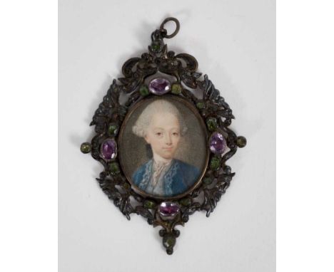 Continental School, circa 1740, watercolour miniature portrait on ivory, a young gentleman with powdered wig and blue coat, a