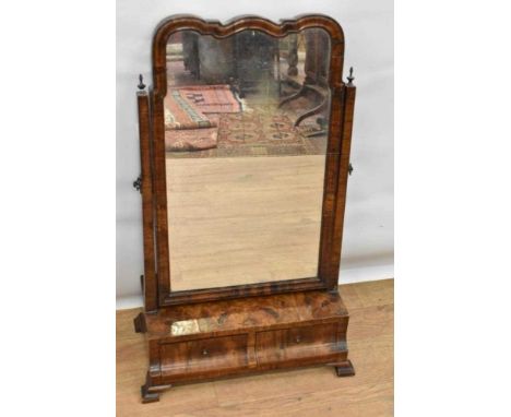 George I style figured walnut dressing table mirror, with ogee shaped swing mirror plate and two drawers to the platform base