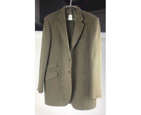 Vintage tweed Phillips & Piper Ltd. Pytchley hunting coatProvenance: removed from Spout Farm, Groton