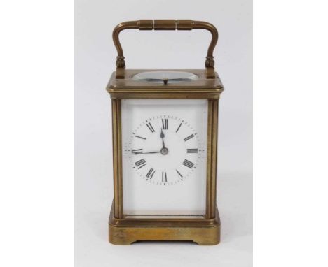 Early 20th century French repeating carriage clock in brass case. 17cm with key