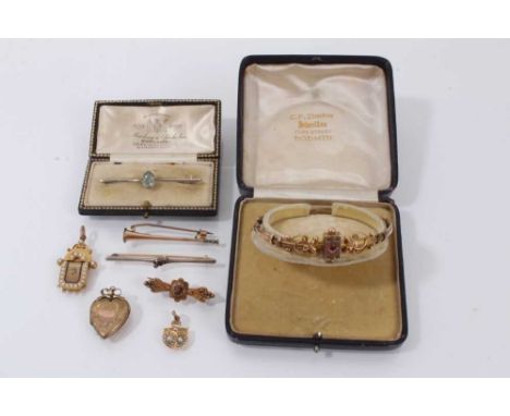 Group of Victorian and Edwardian gold and yellow metal jewellery to include a hinged bangle, four brooches, locket and two pe