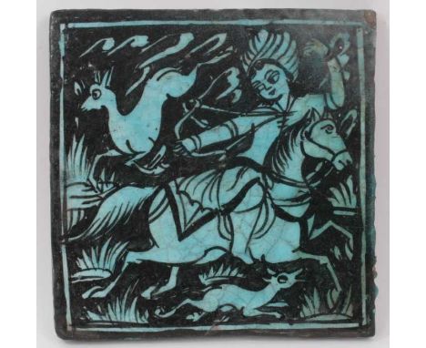 Large Islamic turquoise tin glazed pottery tile with an equestrian scene, 24.5cm x 25cm