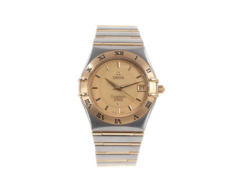 Omega Constellation Perpetual Calendar bi-metal wristwatch, the circular gold dial with engine turned decoration, gold baton 