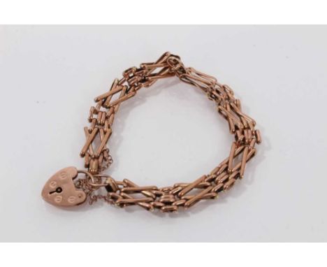Edwardian style 9ct rose gold gate bracelet with padlock clasp, 19cm.Good condition commensurate with age. Weighs approximate