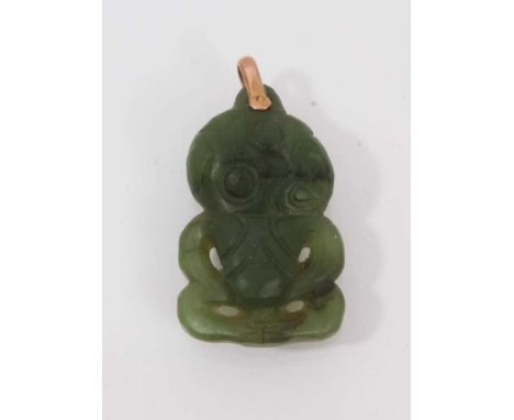 Antique Māori Tiki pendant, the carved and pierced nephrite jade figural pendant with gold mount, 28mm.Provenance:  From a de