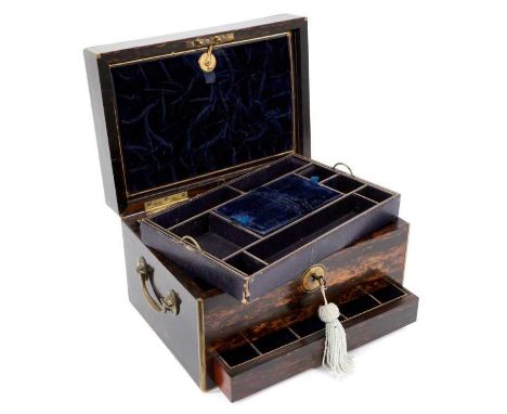 Victorian coromandel and brass bound jewellery box, by Austin of Dublin, of small size, with flanking drop handles, the fitte