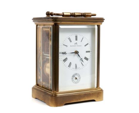 Mathew Norman repeating carriage alarm clock in brass case with paperwork, keys and original box. 17cm