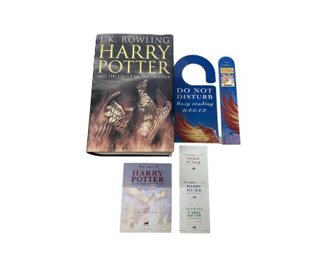 A first edition hardbound copy of Harry Potter and the Order of the Phoenix, with a small collection of ephemera.