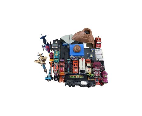 A 1985 MASK Boulder Hill Playset and a large selection of vehicles (many with instructions), by Kenner