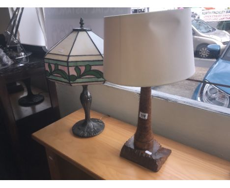 A lighthouse lamp, Tiffany lamp plus another