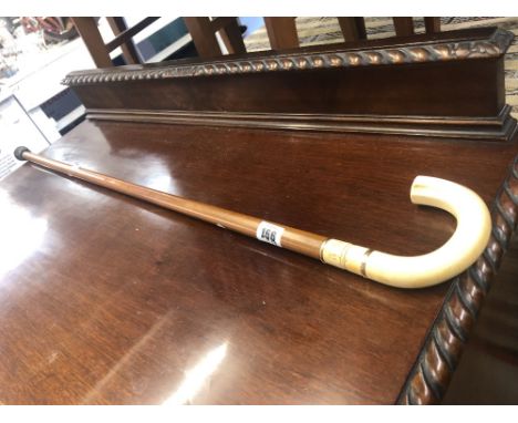 A good quality gold mounted walking stick