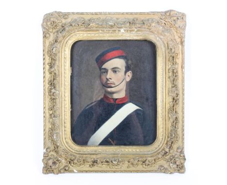 A circa 1900 portrait of a soldier, oil mounted on board. Wearing a blue and red forage cap and white sash, perhaps from a Ro