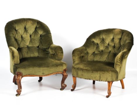 A pair of near matched late Victorian his and hers button back elbow tub chairs. Upholstered in green velvet, his chair with 