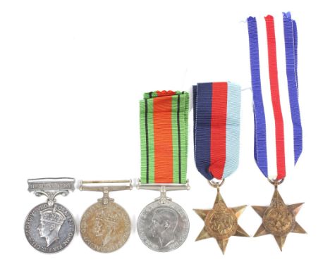 A five piece WWII medal group. Comprising: a War medal, Defence medal, France &amp; Germany star, 1939-45 Star and regular ar