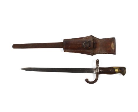A late 19th century French bayonet. The underside of the blade incised Mme d'Obrmes de Ste Etienne Fevrier 1876, the guard st