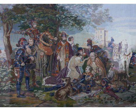 A large guilt framed needlework tapestry. Set in a 19th century gilt and plaster frame, depicting a Continental Medieval scen