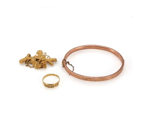 A small group of antique gold jewellery, comprising:a 9ct gold hollow hinged bangle,oval in shape, with a flat profile and sc