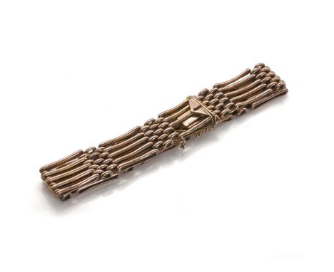 A rose gold gate bracelet, with five rows of gate links, to an integral open box clasp, with curb link safety chain, 190mm lo