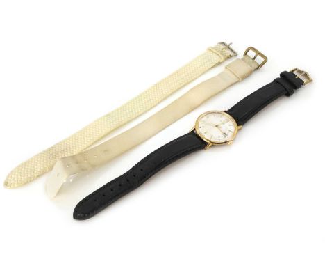 A gentlemen's gold plated Omega mechanical strap watch,  33mm diameter, with a silvered dial, gilt Arabic numerals to the qua