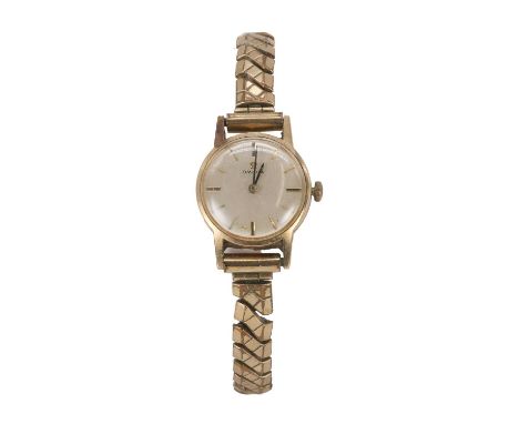 An Omega 9ct gold cased watch, case size 20mm, signed Omega on a silvered dial, with gilt baton hour markers, 9ct gold cased,
