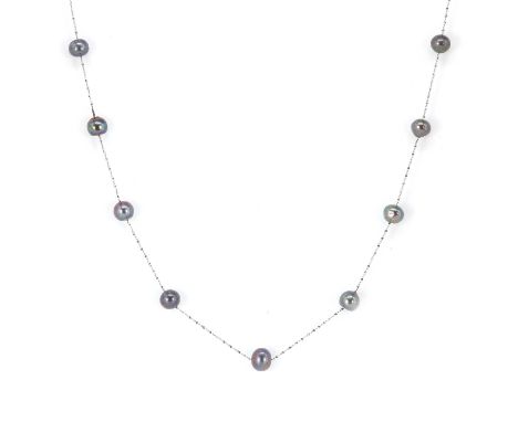 A white gold cultured pearl satellite necklace, with nineteen cultured black pearls, untested, spaced along a white gold serp