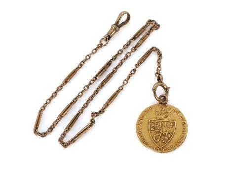 A George III gold 'spade' guinea and a 9ct gold watch chain, A George III gold 'spade' guinea, dated 1792, to a soldered pend
