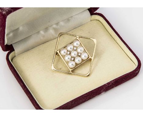 A Mikimoto cultured pearl and diamond 14K marked yellow metal brooch, the diamond shaped centre set with nine pearls and four