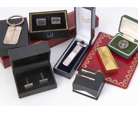 A Cartier lighter,  gold plated rectangular ribbed form, together with a pair of Dunhill cufflinks, silver money clip, Concor