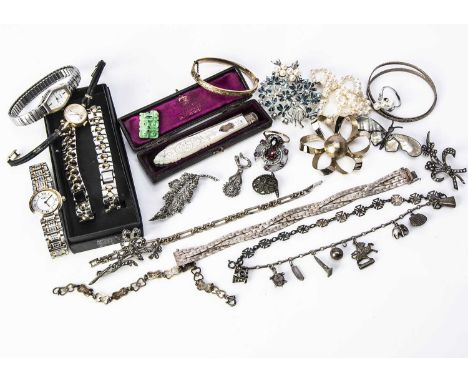 A collection of silver and costume jewels,  including a  mother of pearl silver butterfly brooch, rings, bangles, a leather b