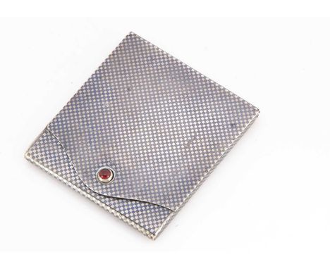 A late 19th century European silver and niello enamel matchbox holder, 5.8cm by 5.2cm, 40.6g, having red cabochon stone butto
