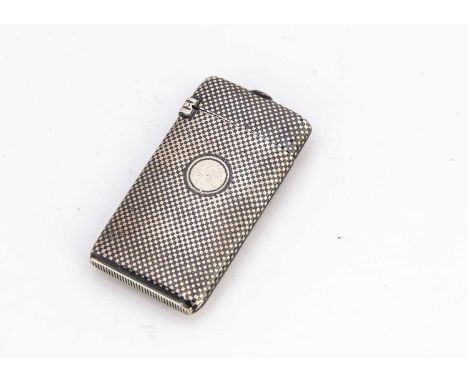 A late 19th century European silver and niello enamel vesta case, 5cm high and 14.2g, with match holder to lid. Provenance: f