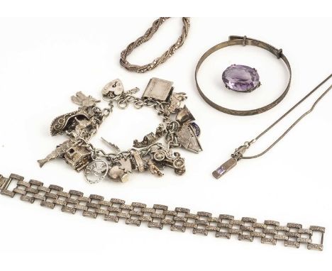 A curb linked silver charm bracelet,  some with enamel decoration, cars, Bible, slipper other items and a silver bracelet, an