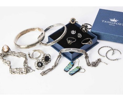 A collection of silver jewels, including some plated items, a silver bangle with floral engraved decoration, earrings and stu