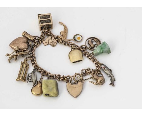 A 9ct gold charm bracelet, the curb linked padlock clasped bracelet, set with various charms, including an 18ct classical rui
